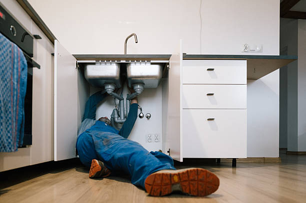 Professional Plumbing technician working in Kent, WA